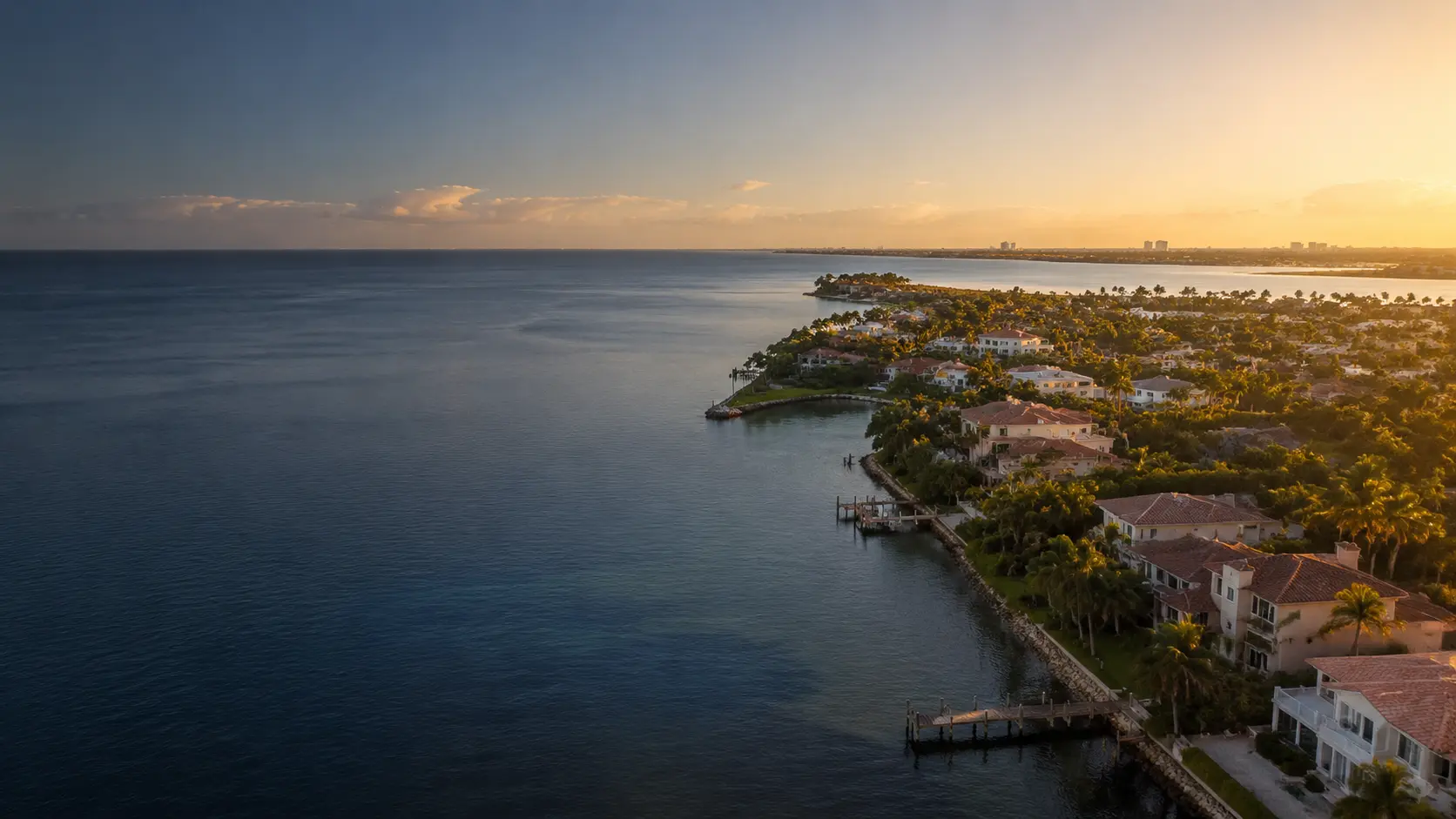 Coastal homes along Tampa Bay at sunset